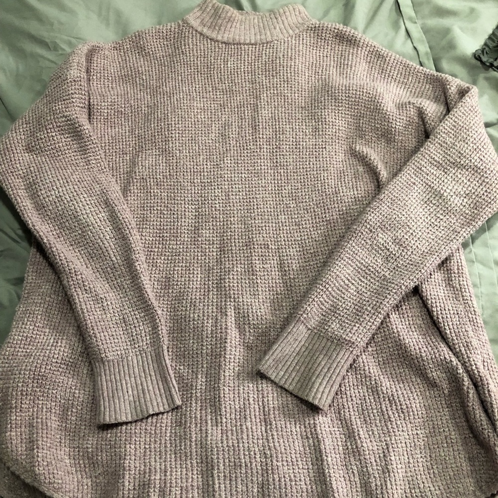 Pink turtleneck sweater